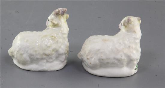 Two early Bow figures of young goats lying recumbent, c.1752-5, l. 5.5cm, ears and horns restored